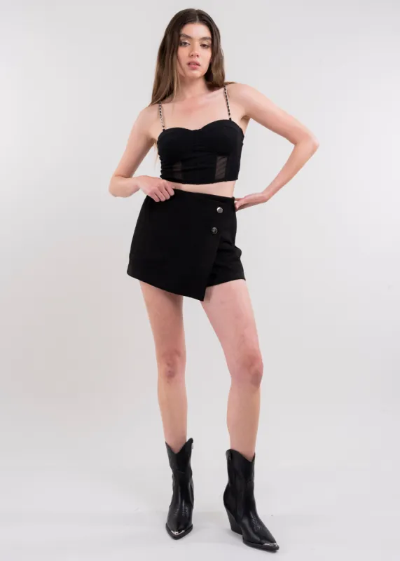 Falda Short Gamuza Botones sold by Shasa