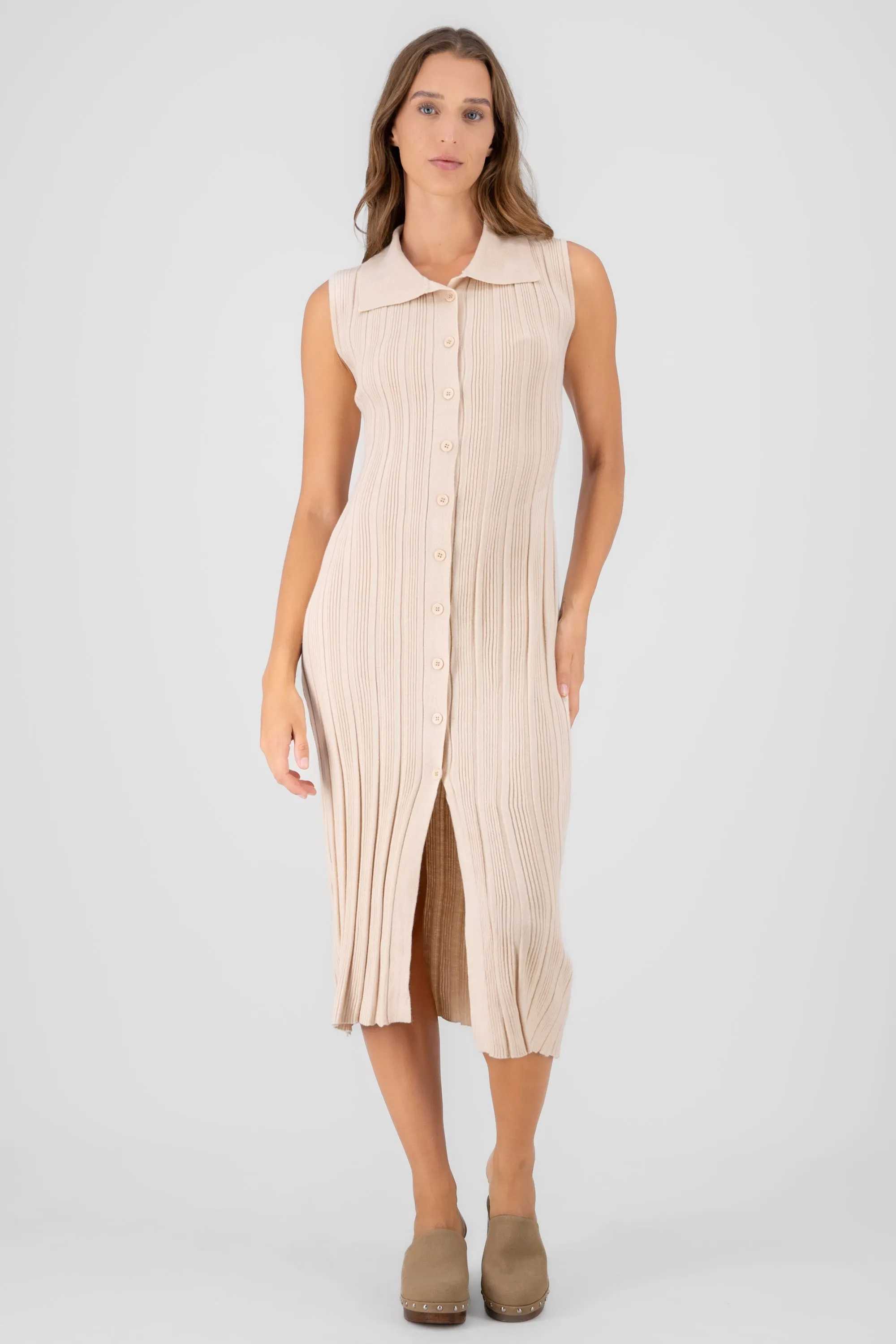 Vestido cuello polo c/botones sold by Shasa