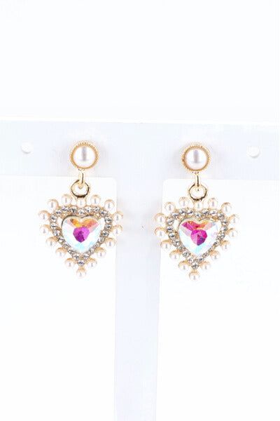 Aretes largos corazón sold by Shasa