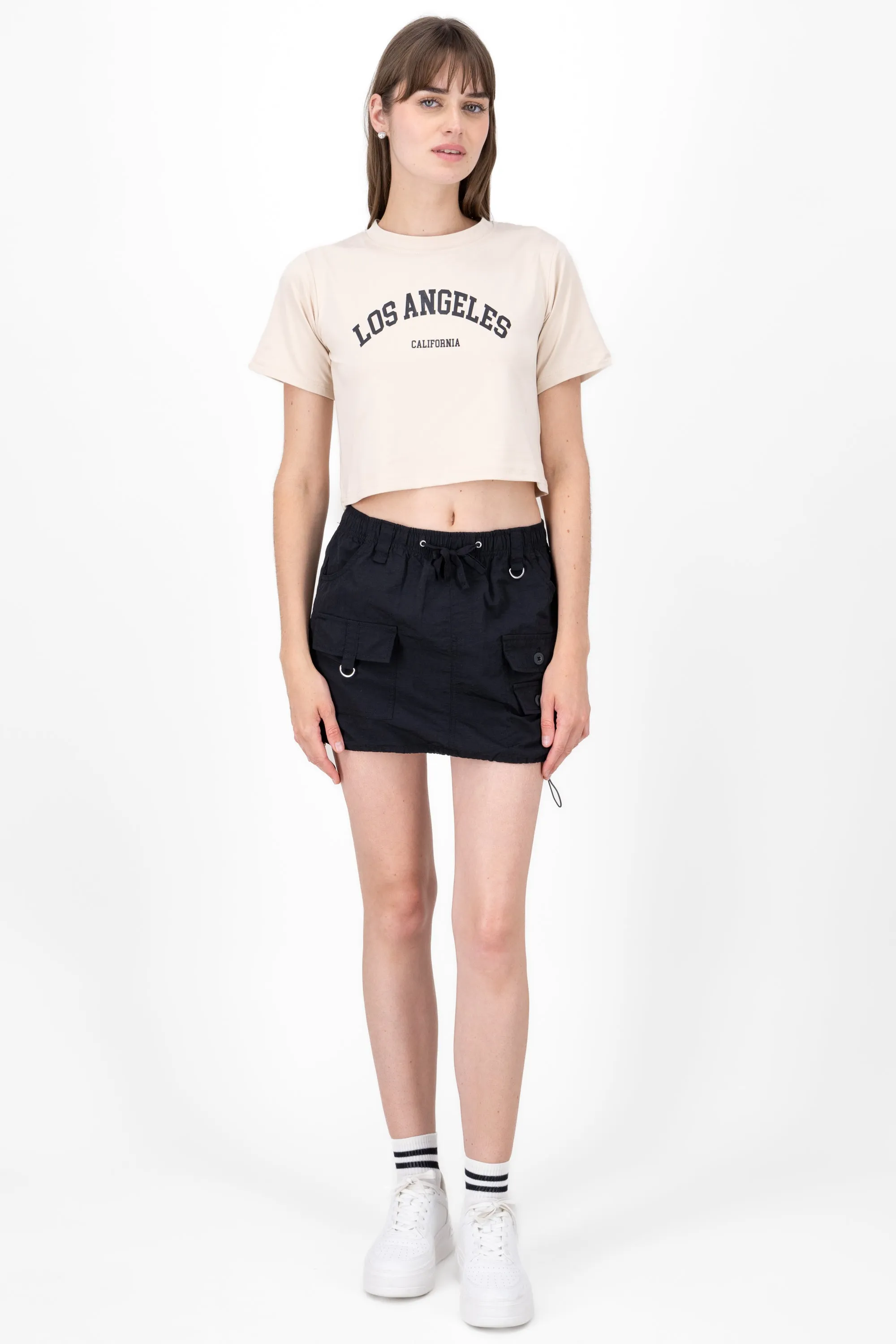 Falda corta tipo parachute c/jarretas sold by Shasa