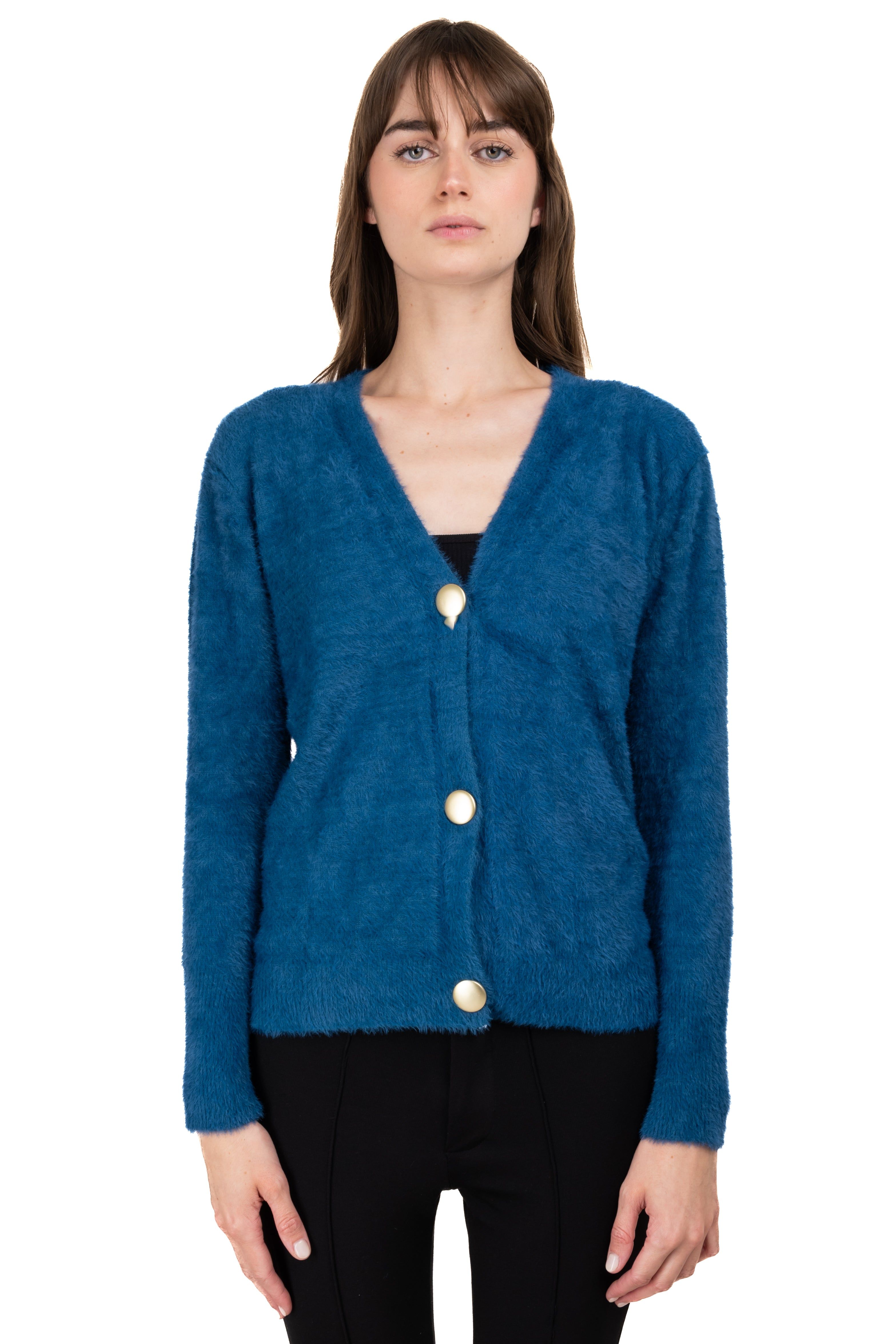 Cárdigan peluche botones sold by Shasa