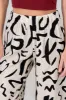 Pantalon fluido detalle estampado sold by Shasa