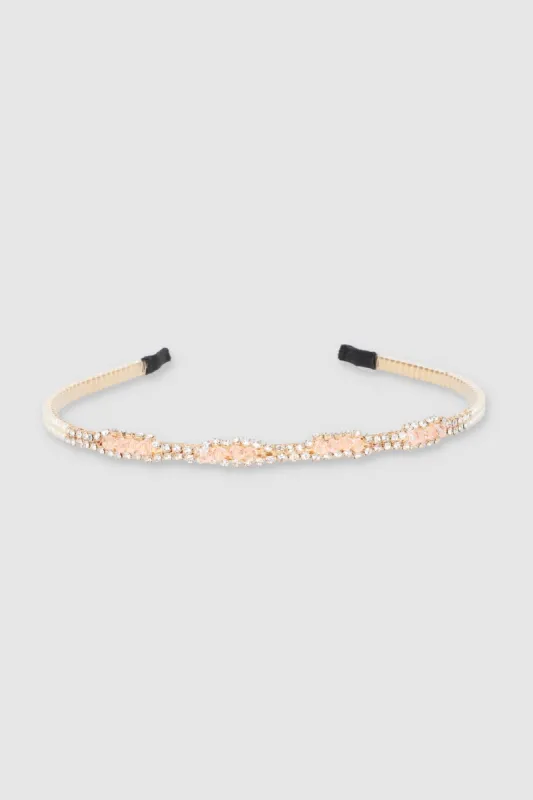 Diadema delgada metálica perlas sold by Shasa