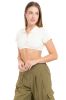 Top crop tejido cuello polo sold by Shasa