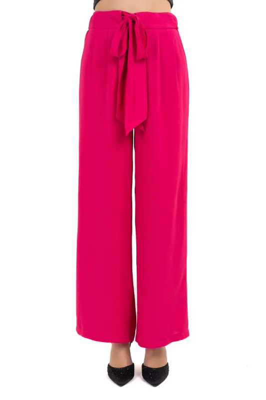 Pantalón cintas moño sold by Shasa