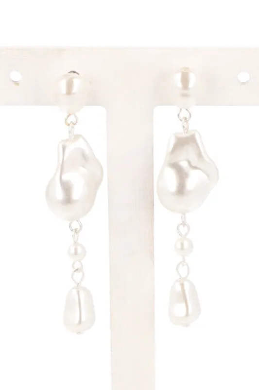 Aretes Perlas sold by Shasa