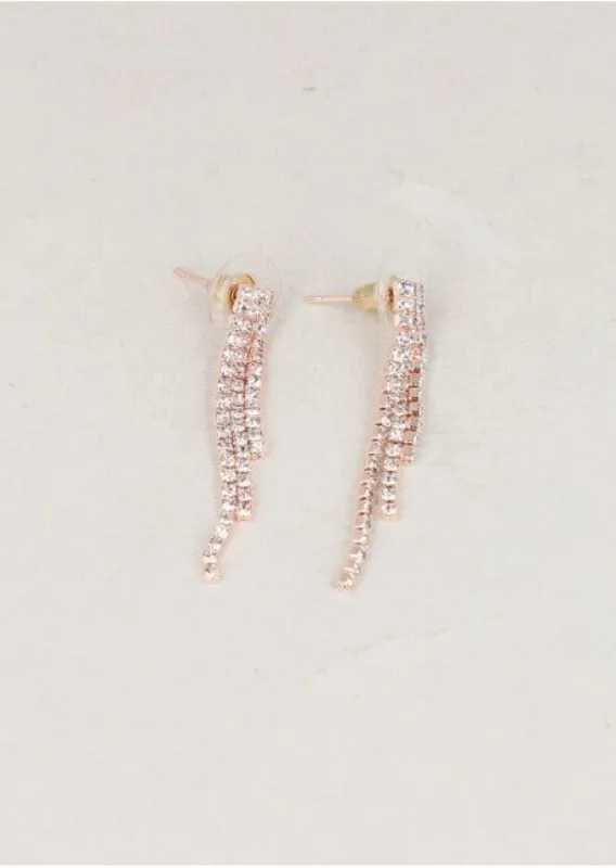 Aretes tiras brillos sold by Shasa