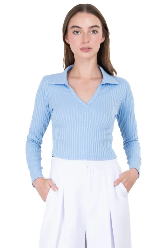Top manga larga cuello polo sold by Shasa