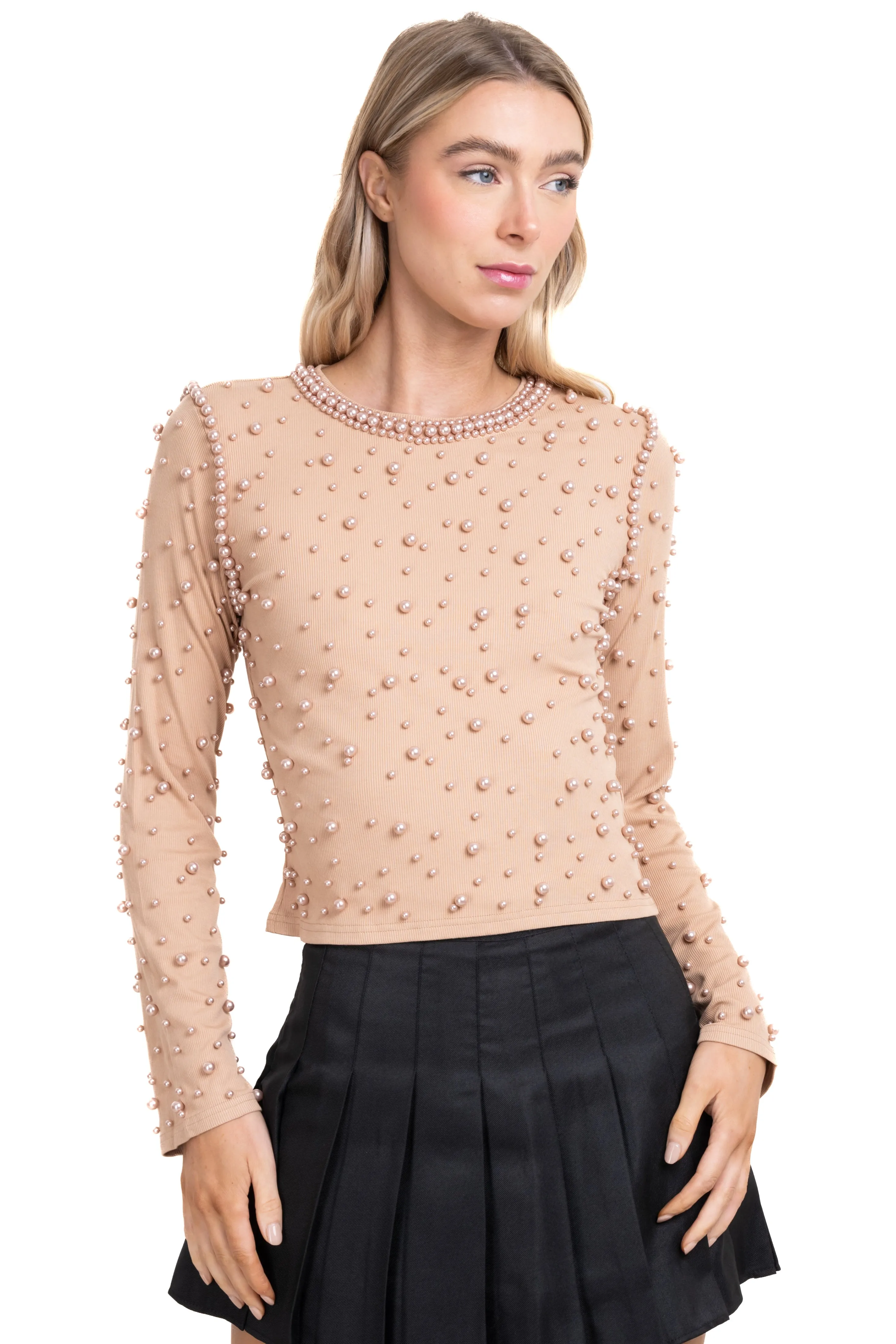 Sueter de perlas y brillos sold by Shasa