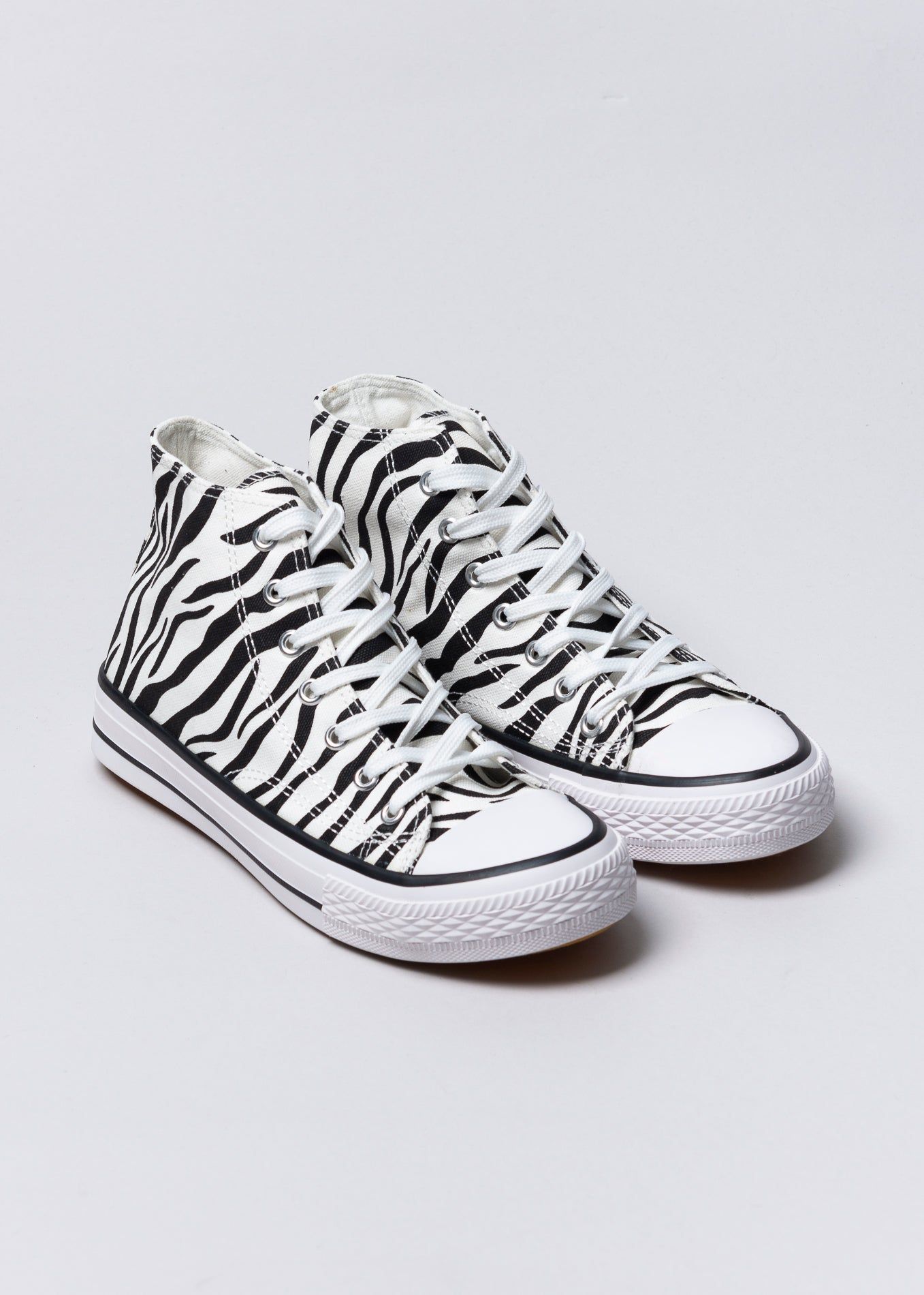 Tenis botín canvas animal print sold by Shasa