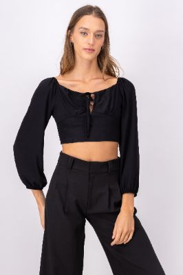 Blusa crop manga abullonada moño sold by Shasa