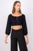 Blusa crop manga abullonada moño sold by Shasa