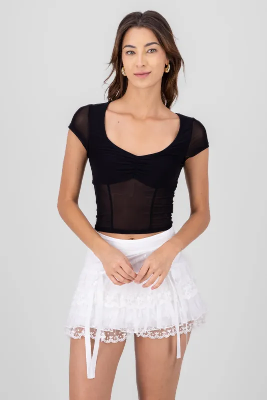 Top crop mesh sold by Shasa