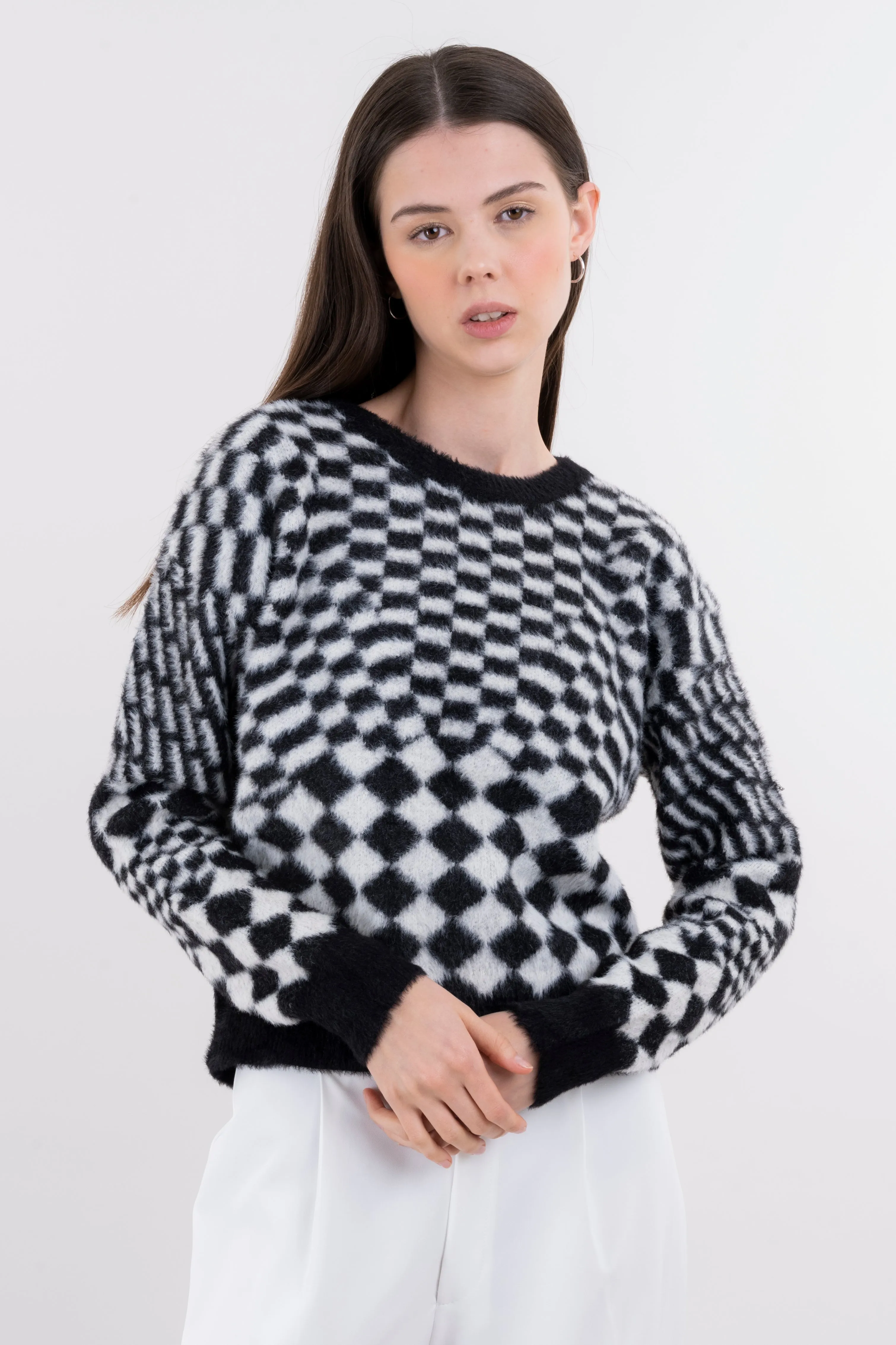 Suéter peluche ajedrez sold by Shasa