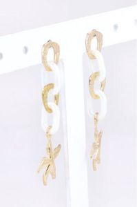 Aretes Cadena Conchas sold by Shasa
