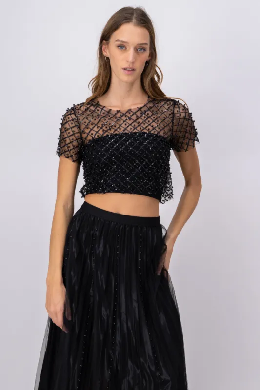 Top mesh manga corta lentejuelas sold by Shasa