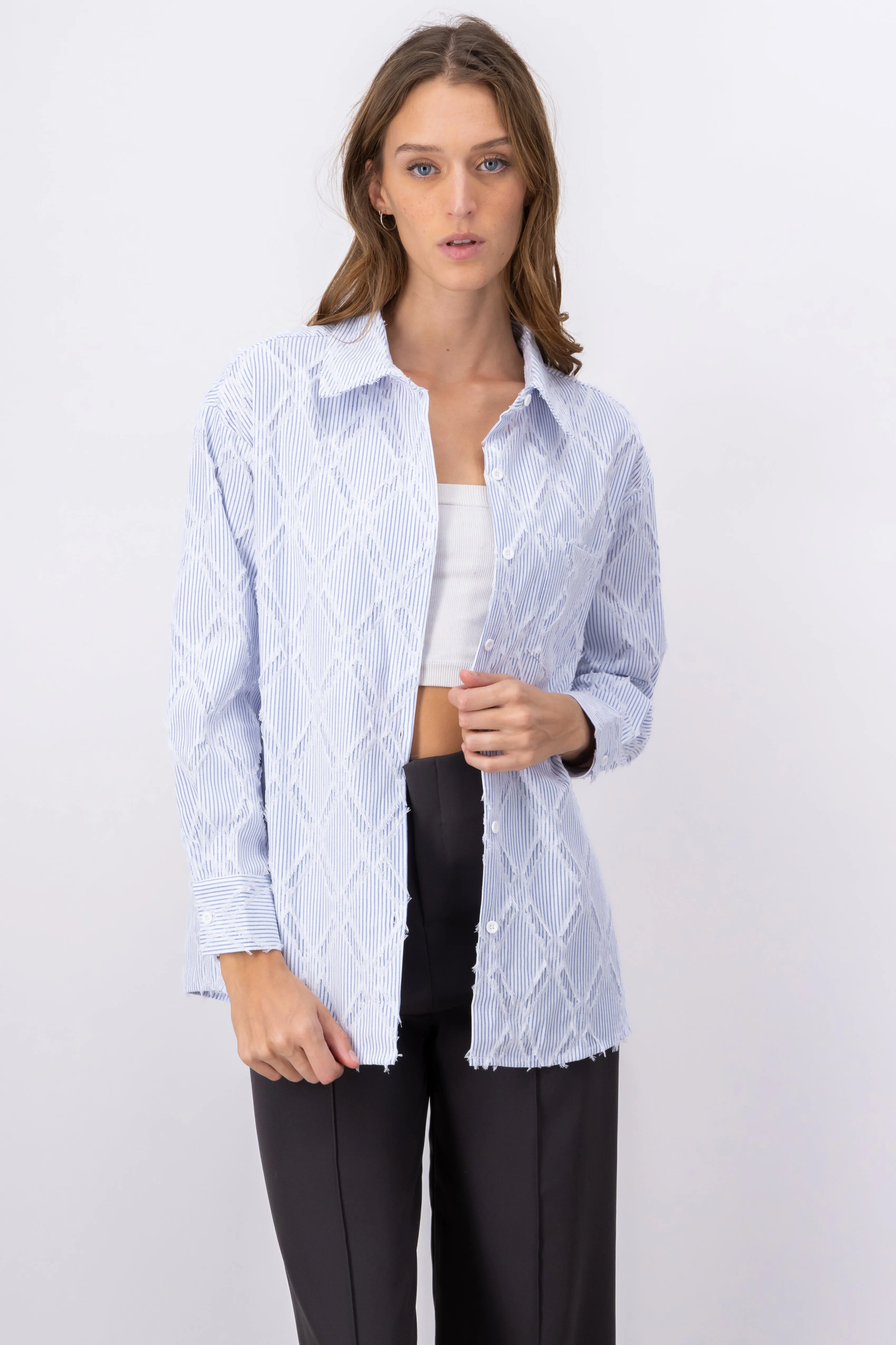 Camisa texturizada rombos flecos sold by Shasa