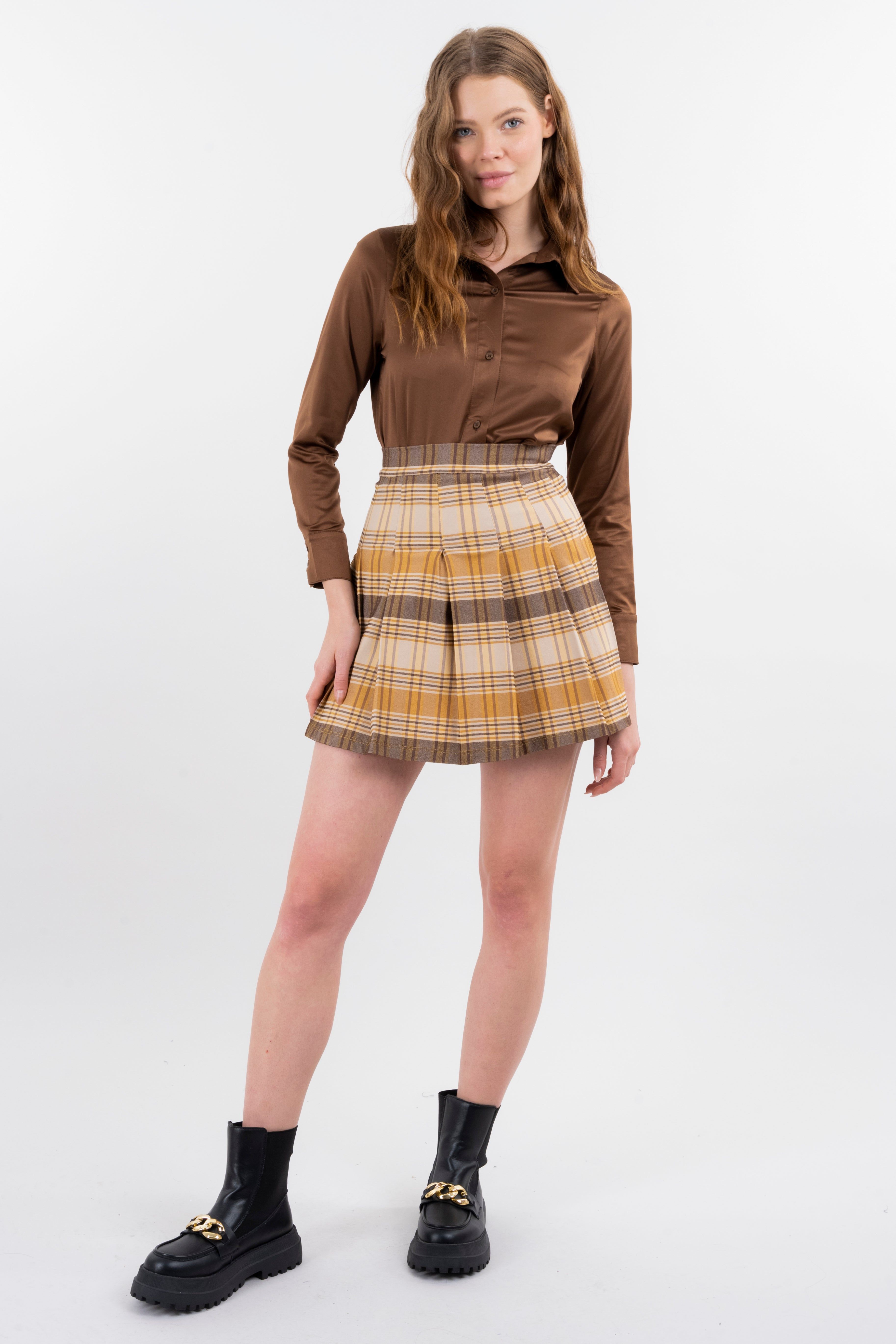 Falda mini cuadros sold by Shasa