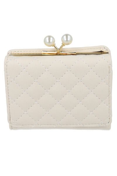 Cartera efecto piel capitonada sold by Shasa