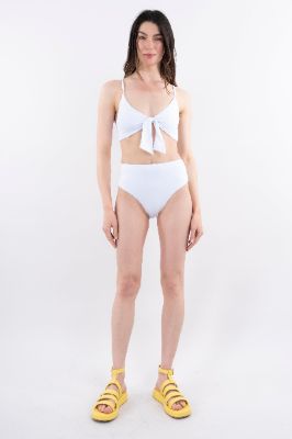 Traje de baño liso moño escote sold by Shasa