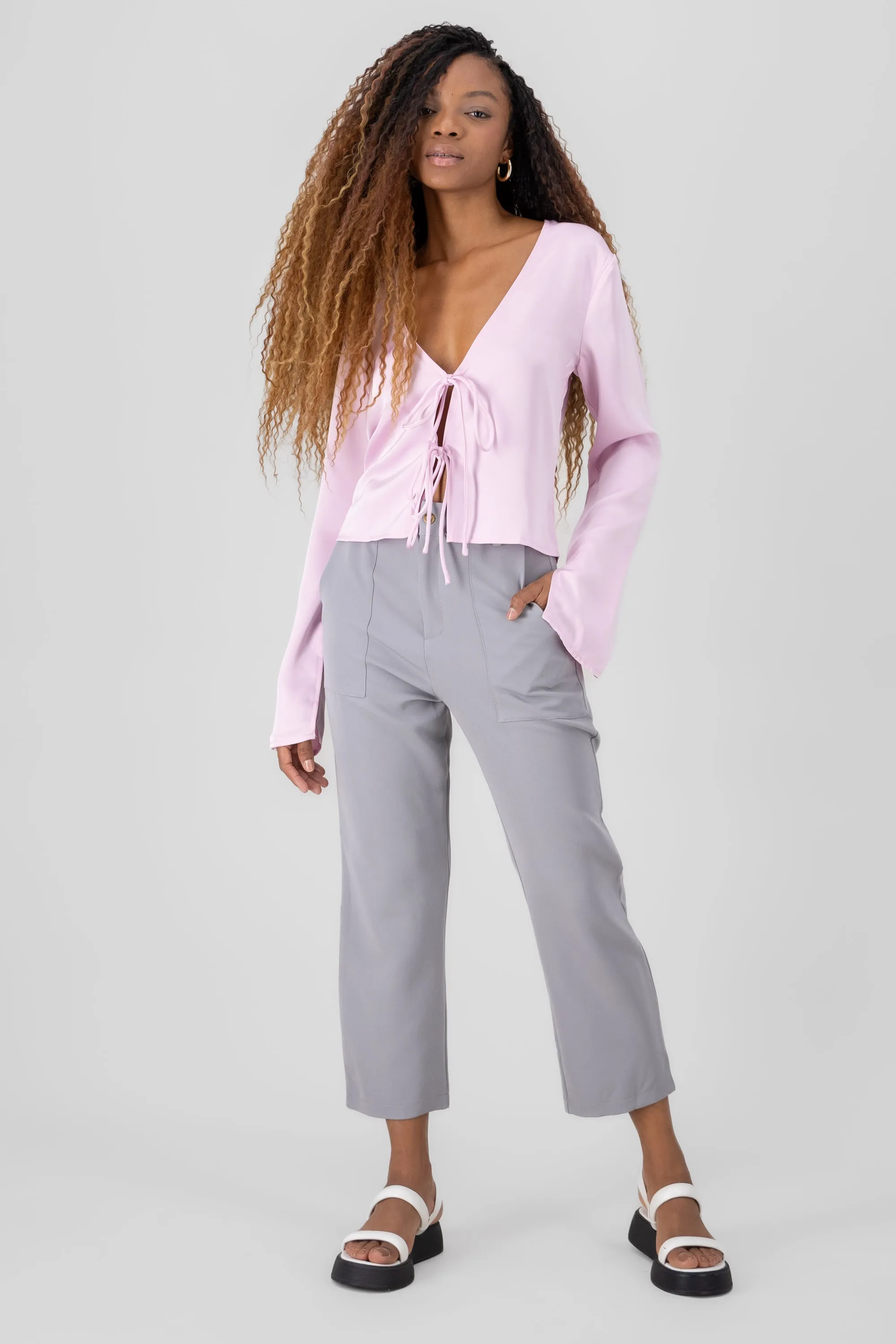 Pantalón Cintura Alta Capri Bolsas sold by Shasa