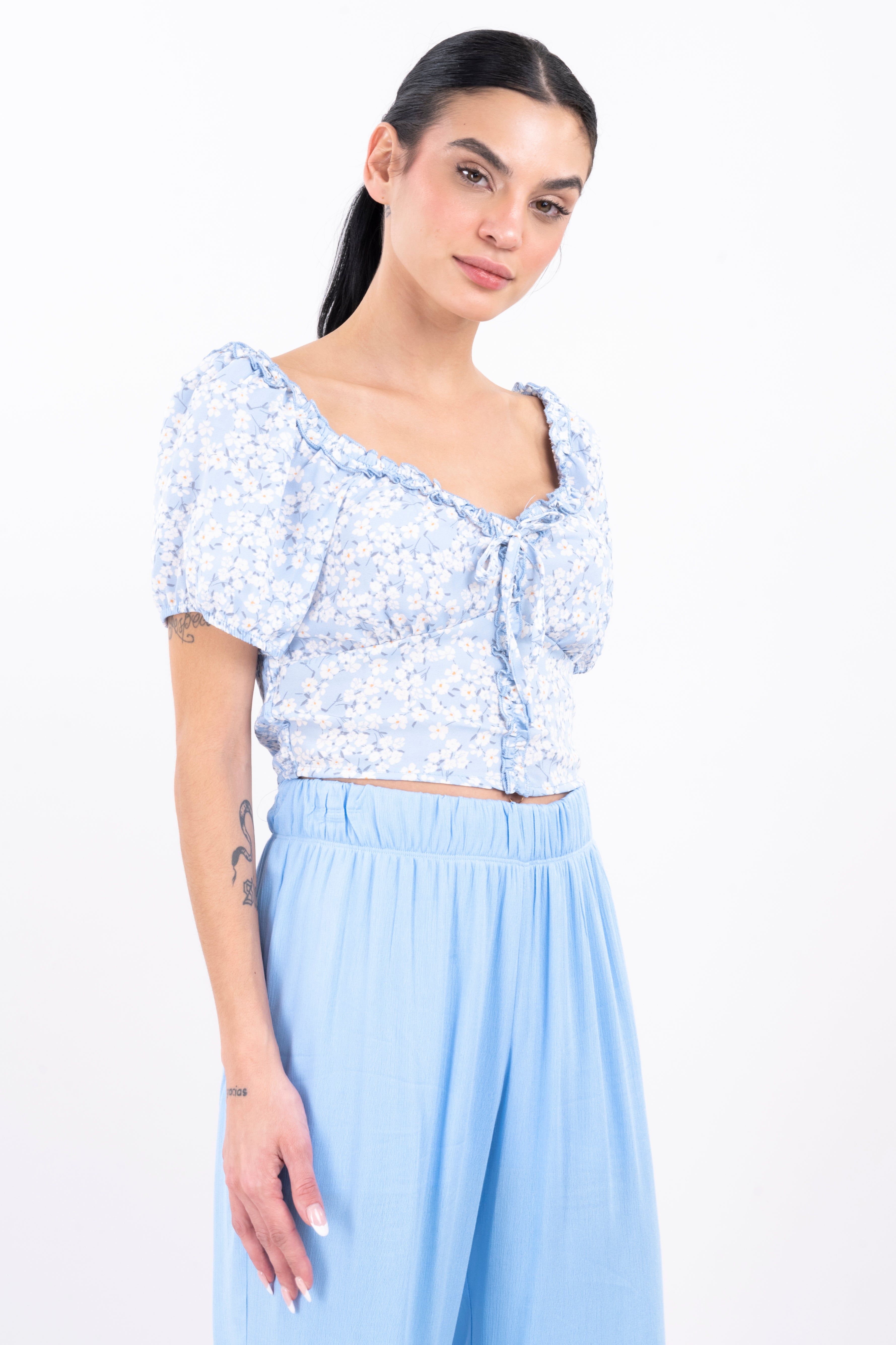 Blusa plisado cintas flores sold by Shasa