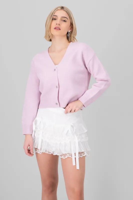 Cardigan botones corazones sold by Shasa