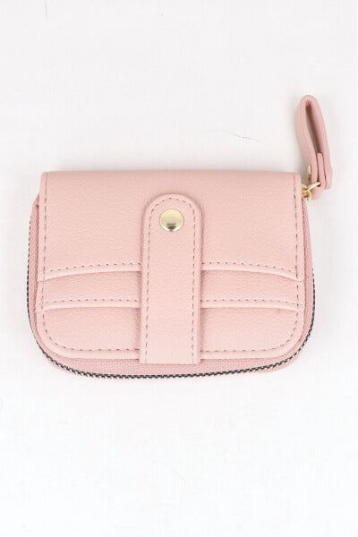 Cartera efecto piel botón sold by Shasa