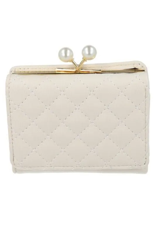 Cartera efecto piel capitonada sold by Shasa