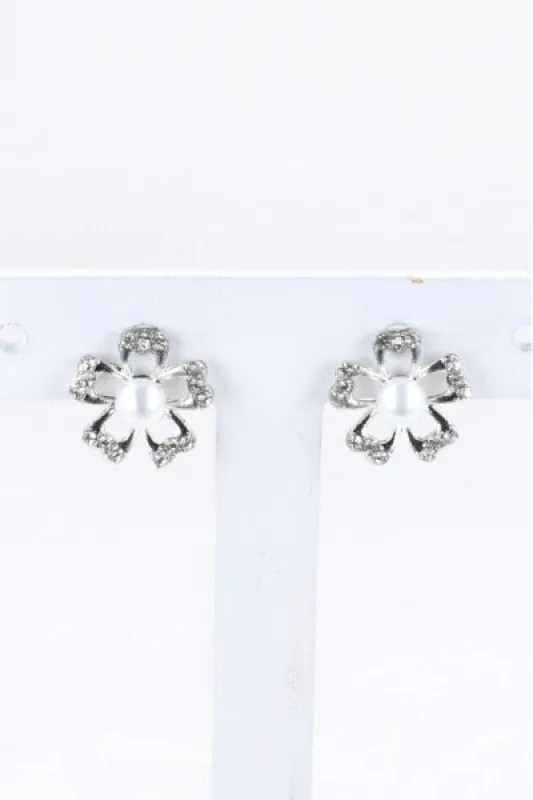 Aretes Flor Brillos sold by Shasa