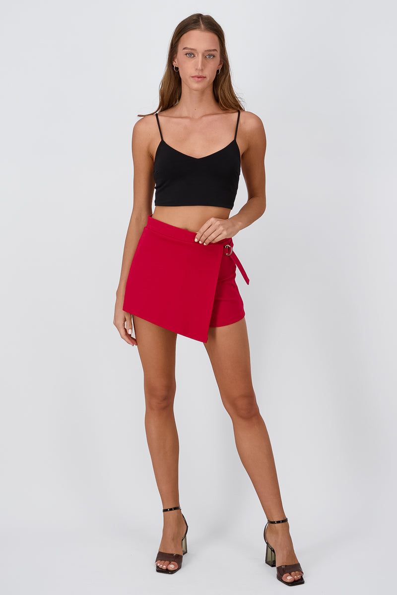 Falda short hebilla sold by Shasa