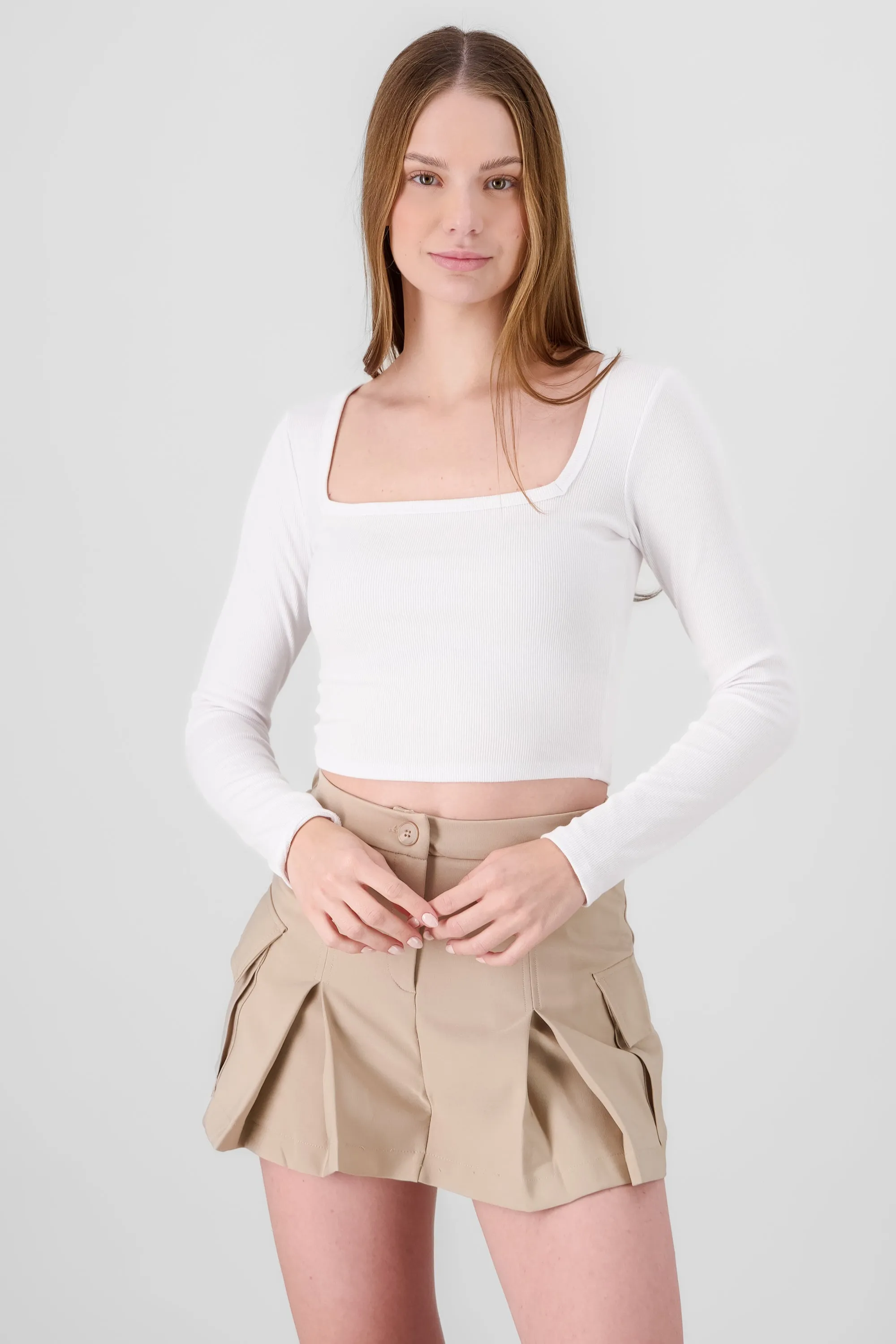 Top manga larga escote cuadrado sold by Shasa