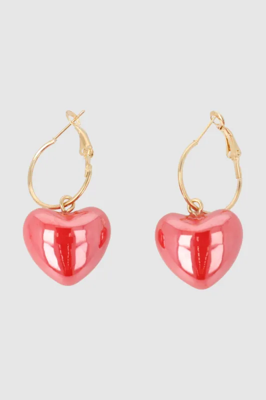 Arracadas corazon nacarado sold by Shasa