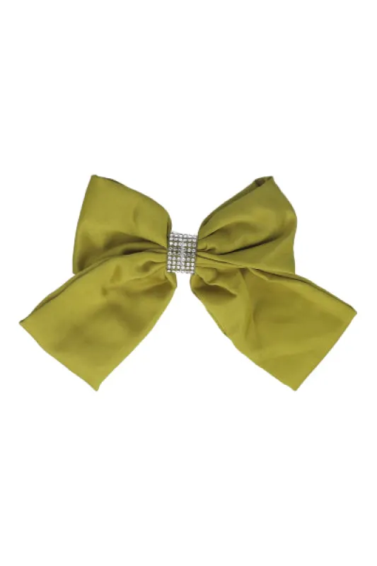 Moño detalle brillos sold by Shasa