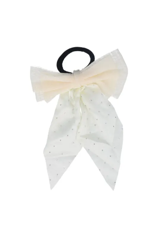 Moño liga brillitos sold by Shasa