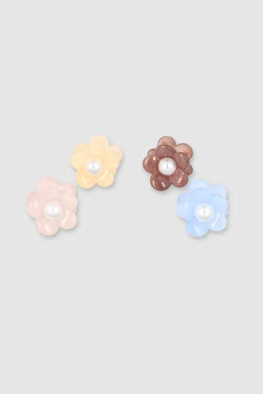 Set 4 pinzas flor perla sold by Shasa