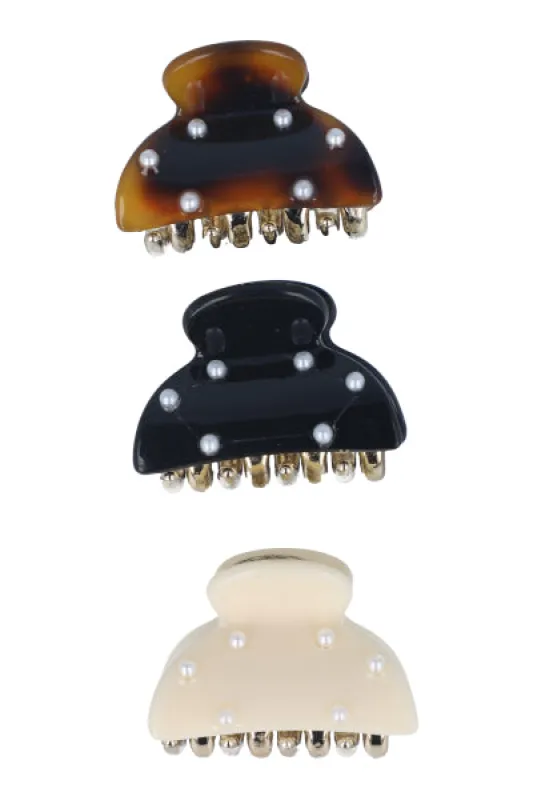 Set 3 pinzas mini perlas sold by Shasa