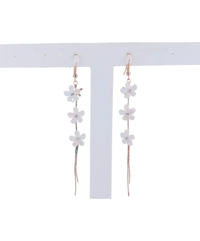 Aretes largos aplicaciones flores sold by Shasa