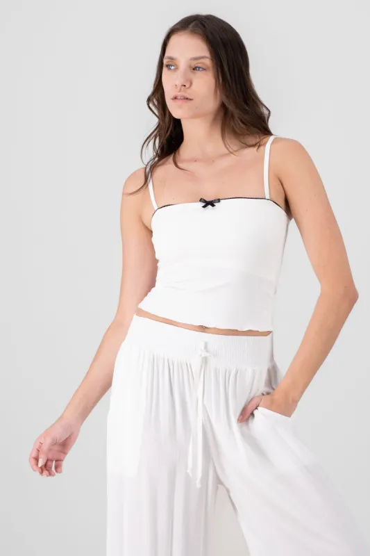 Top detalle contraste con moño sold by Shasa