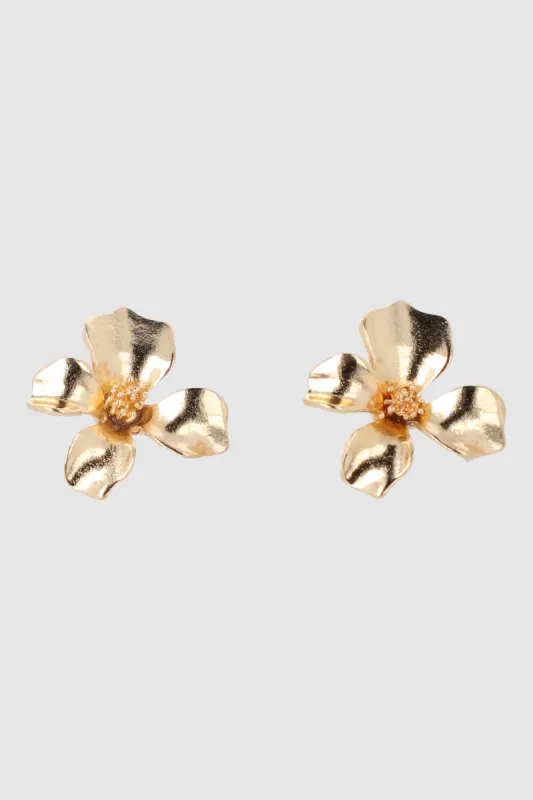 Aretes flor metalica sold by Shasa