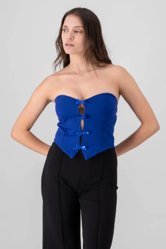 Top strapless detalle moƱos sold by Shasa