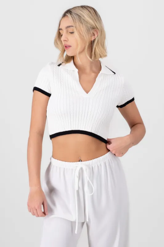 Top cuello polo cadena sold by Shasa