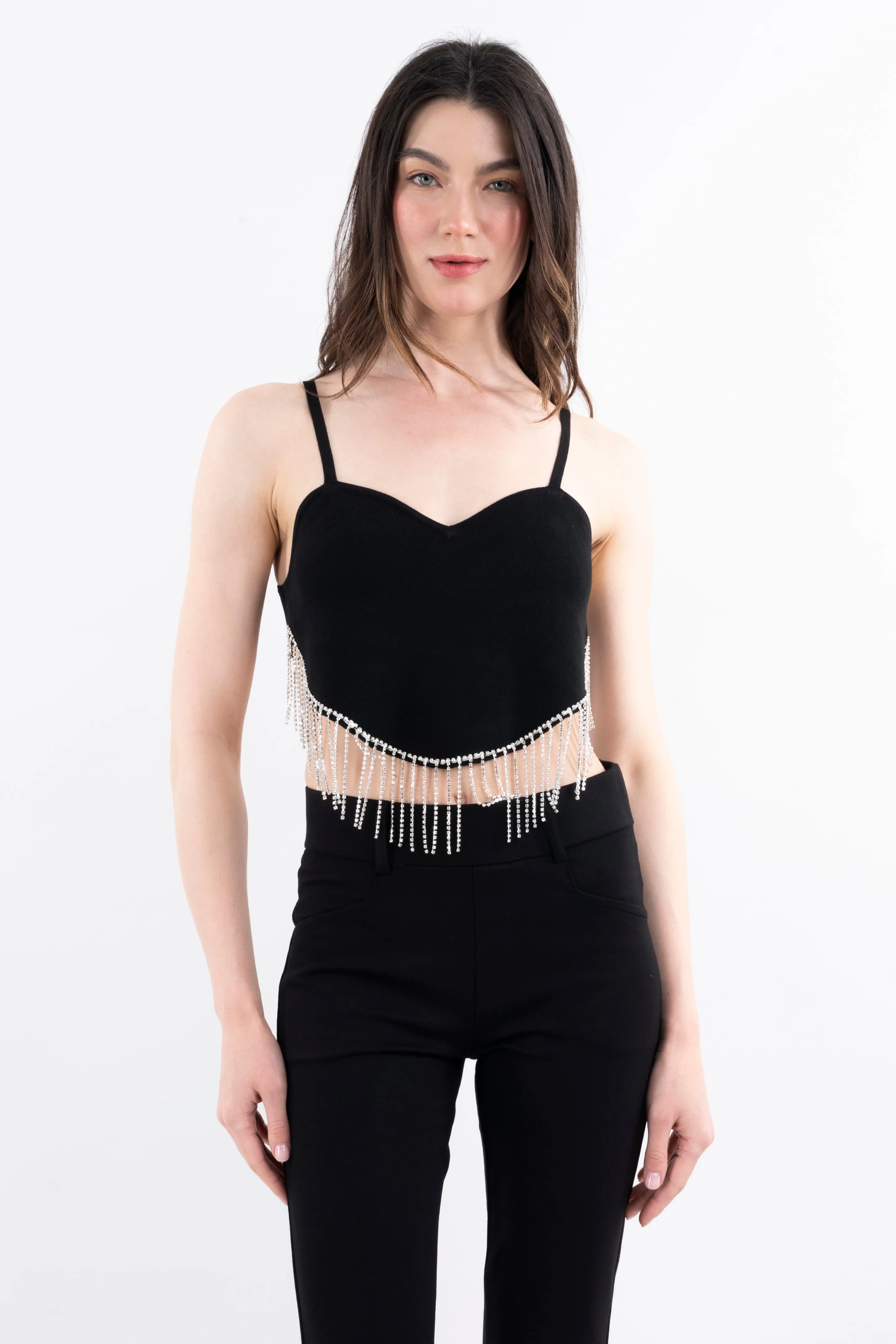 Top crop bajo asimétrico brillos sold by Shasa