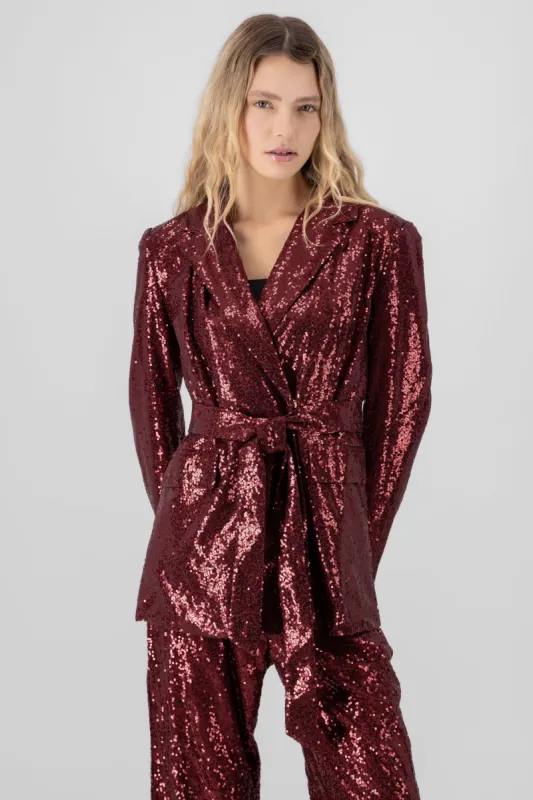 Saco brillos detalle cinturon sold by Shasa