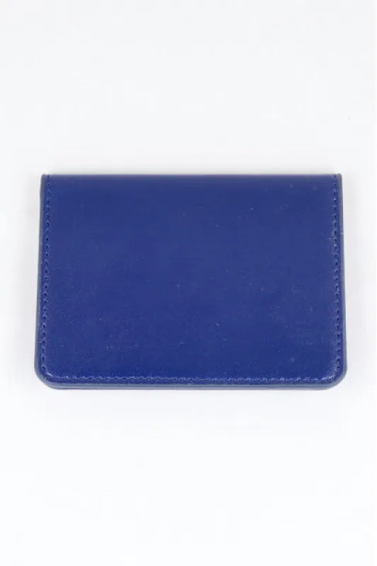 Cartera efecto piel monocolor sold by Shasa