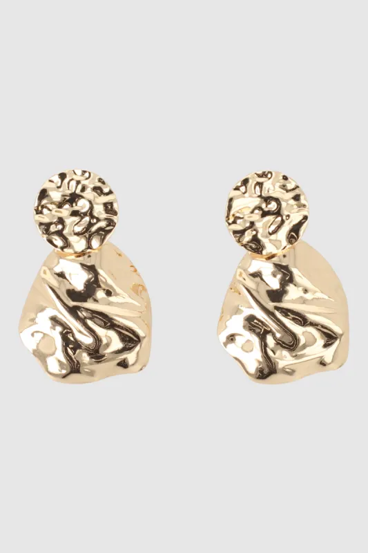 ARETES CIRCULOS MARTELINADOS sold by Shasa