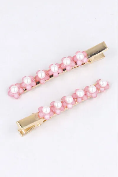 Set 2 piezas pasador flores sold by Shasa