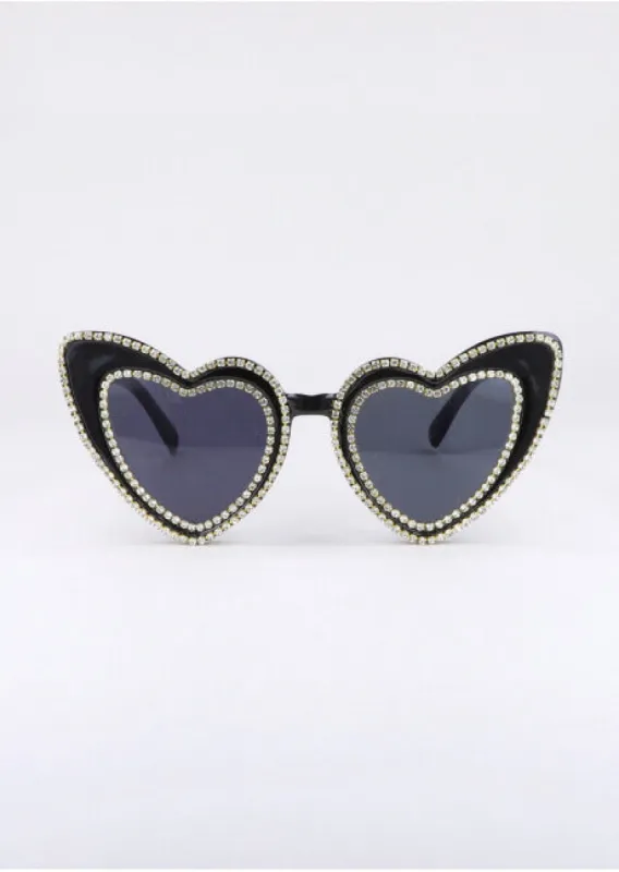 Lentes oversize corazones brillos sold by Shasa