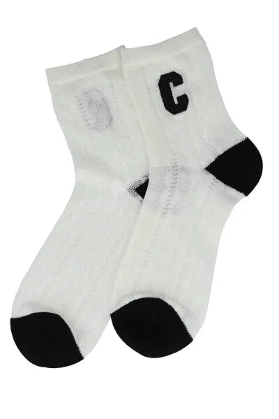 Calcetas bicolor letra sold by Shasa