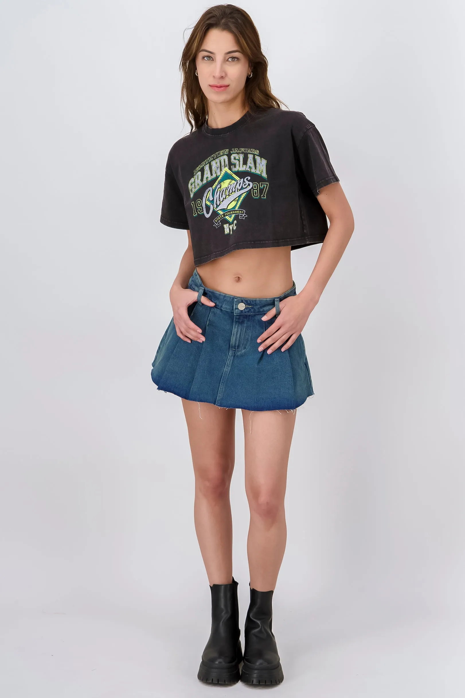 Falda mini denim tableada sold by Shasa